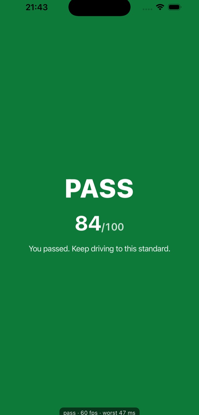 The end-of-drive reveal: a full-screen green PASS with a score of 84 out of 100 and the line 'You passed. Keep driving to this standard.'